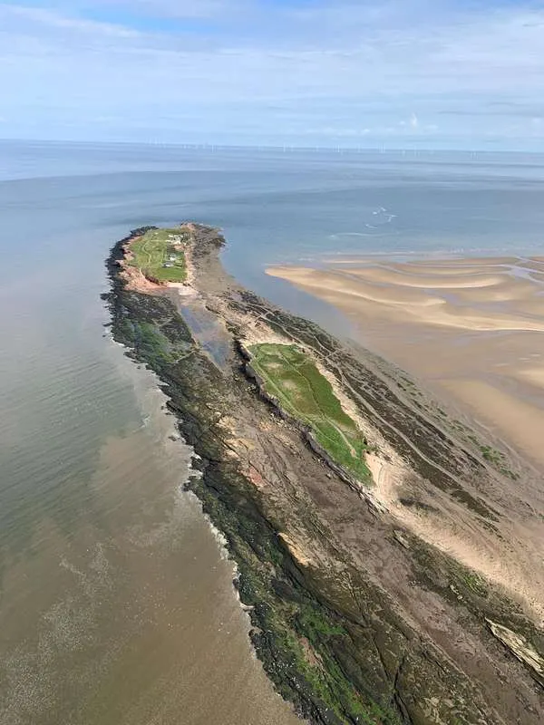 Aerial view of Hilbre and Middle Eye at low tide, with sandbanks to the right